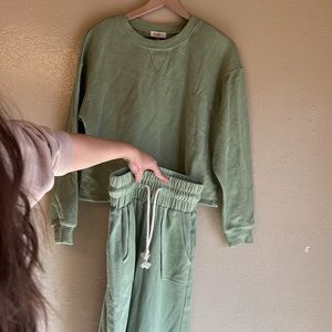 Cozy lounge set with high-waisted loose pants and a cropped sweatshirt top